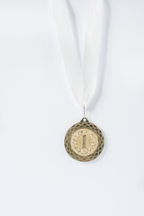 First place - a gold medal on a white background.