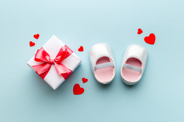 Baby girl pink shoes with gift box. Baby shower party set