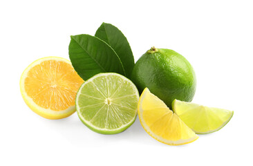 Fresh ripe lemon, limes and green leaves on white background