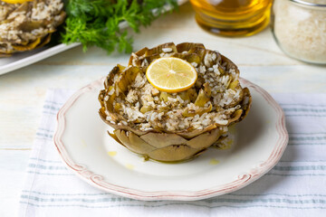 Fresh delicious stuffed artichoke, best Turkish food. Turkish name; Zeytinyagli Enginar Dolmasi