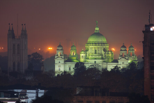 Illuminated memorial of Queen Victoria, in the city of Kolkata at night, close-up
