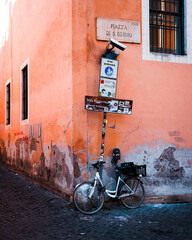 A bicycle parked at a side street somewhere in Rome, Italy