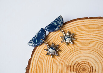 Blue semicircle studs with snowflake. Handmade jewelry.