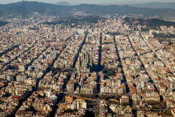 Aerial view at residential quarters of Barcelona in sunny day.