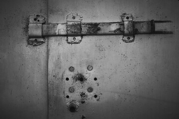 Image of constipation on a steel gate.