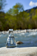 Glass flask with clean drinking water.