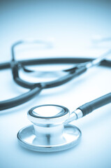 Medical Stethoscope on White background with Blue Toning