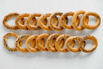Dried bagels with poppy seeds on a white background