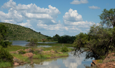 Fototapeta na wymiar Batihako Dam and hide from Moloto Drive, Pilanesberg Game Reserve, North West.