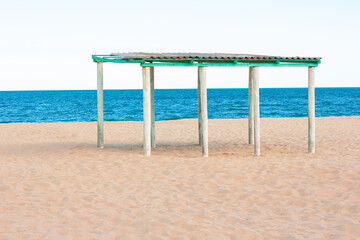 Shed on the beach . Pavilion on the seaside 