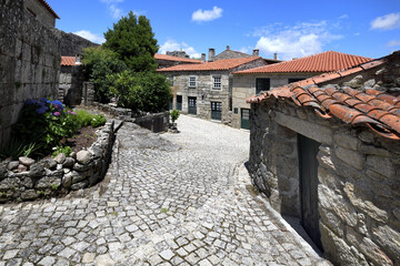 Fototapeta na wymiar Narrow cobbled street in the medieval mountain village of Sortelha, Serra da Estrela, Beira Alta, Portugal