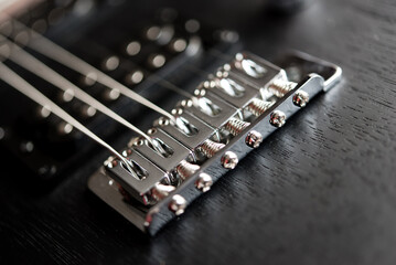 close up of a guitar, blurred focus