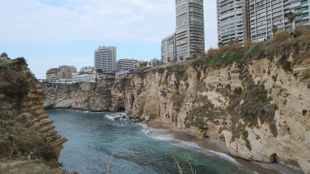 Pan shot Beirut towers near al rouche rocks in Beirut, Lebanon during daytime