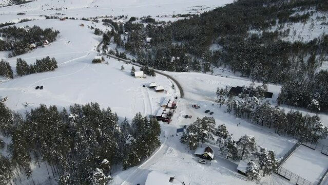 Zlatibor Mountain, Serbia on Winter Season, Aerial View of Tornik Ski Center, Snow Capped Hills and White Landscape, Drone Shot