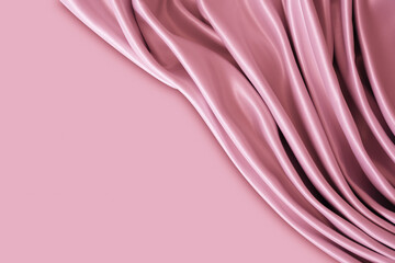 Beautiful elegant wavy light pink satin silk luxury cloth fabric texture with monochrome background design. Copy space