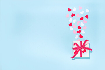 Valentine day simple greeting card flatlay. Valentines holiday background with red, pink, white...