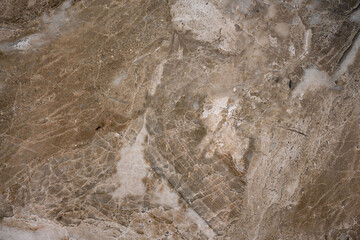 Background of polished stone, light brown granite