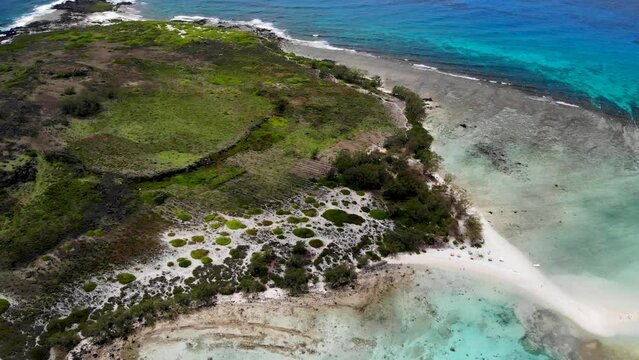 Aerial view on a bay with catamarans between Flat and Gabriel islands 