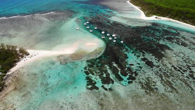 Aerial view on a bay with catamarans between Flat and Gabriel islands 