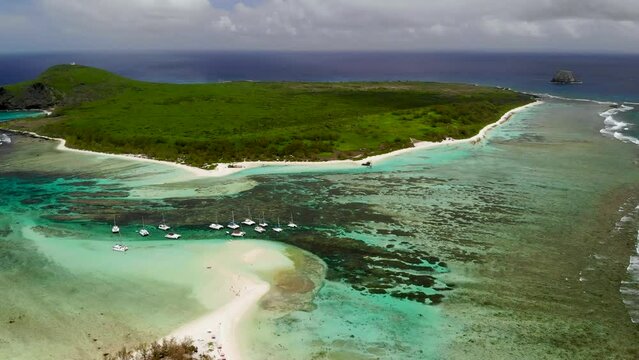Aerial view on a bay with catamarans between Flat and Gabriel islands 