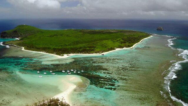 Aerial view on a bay with catamarans between Flat and Gabriel islands 