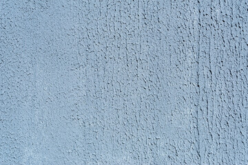 Close-up, texture of a gray facade made of decorative plaster.