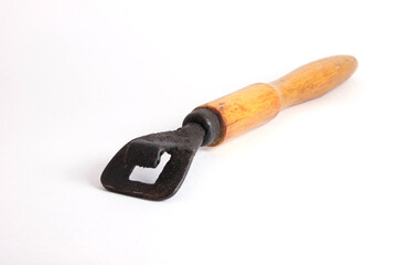Chapelnik - national Slavic kitchen utensils, a removable handle for a frying pan on a white background. 