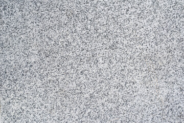 Close-up, texture, background of gray granite wall.