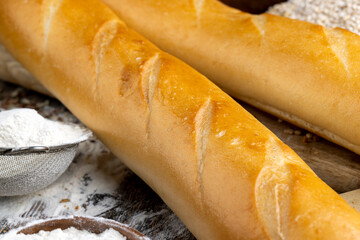 pieces of wheat baguette on a cutting board
