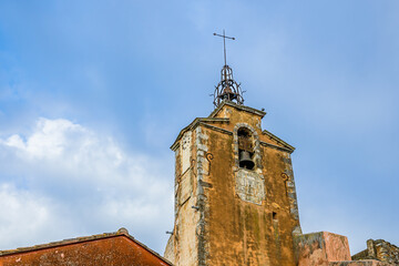 Fototapeta na wymiar Belfry and clock tower of the village of Roussillon in Provence, France