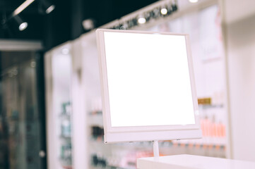 Close-up, white billboard mockup. Against the backdrop of a supermarket. Product promotion concepts.