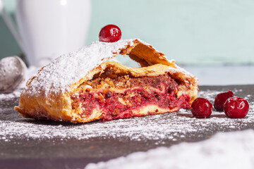 Strudel with a cherry. Cherry pie.