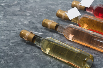250 ml bottles with blank label on grey background. Red, pink and white wine assortment....