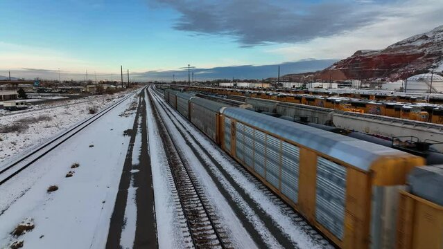 Aerial Shot of Moving Train at North Salt Lake Railways in Utah -