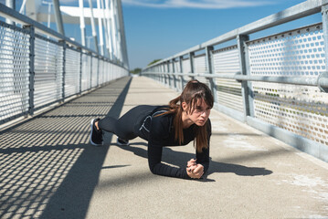 Young active sporty business woman morning routine of stretching and running exercising outdoor before she go to the work at office. Self loved female fitness workout training for healthy life.