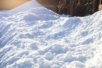 Large snowdrifts of snow, the concept of winter. Cold, ice, snow, winter
