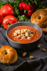 Autumn tomato cream soup with croutons