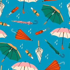 Different umbrellas in various positions. Open and folded umbrellas. Hand drawn colored Vector illustration. Cartoon style. Square seamless Pattern. Background, wallpaper © Dariia