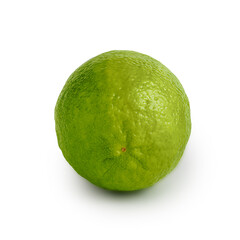 Fresh green lime isolated on a white background with natural shadows