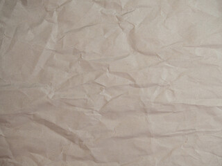 Crumpled wrinkled wrapping paper with abstract texture. Empty blank