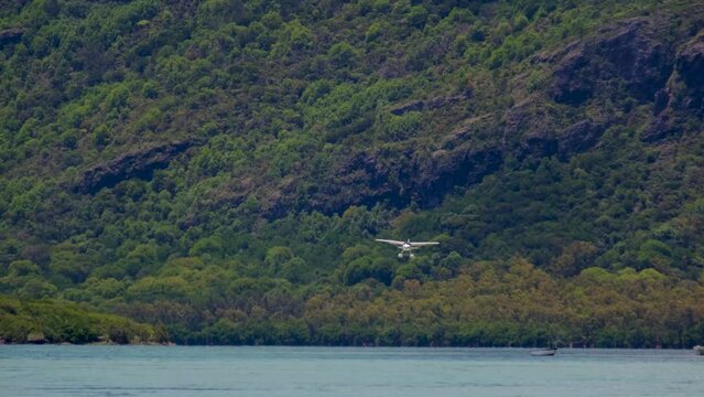 Float plane landing near Le Morne in Mauritius