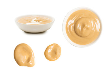 Mushroom sauce in a bowl isolated on white background.