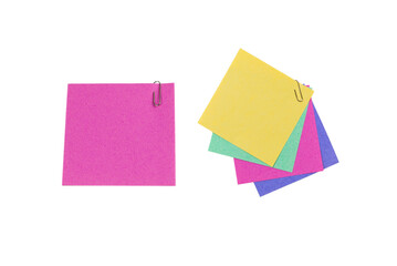 A sticker and a paper clip isolated on a white background