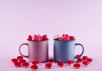 pink and blue cup with gummy candies