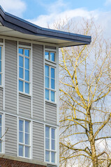 Fragment of a house or apartment building with nice window.