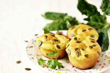 Green muffins with spinach juice with pumpkin seeds. Patrick's Day meals .cupcake spinach