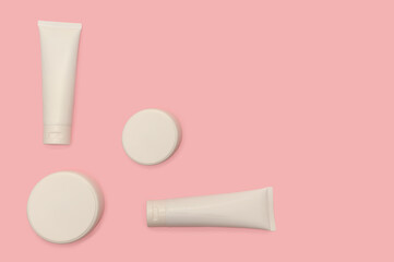 Cream and lotion in a white plastic container for skin. Close-up.