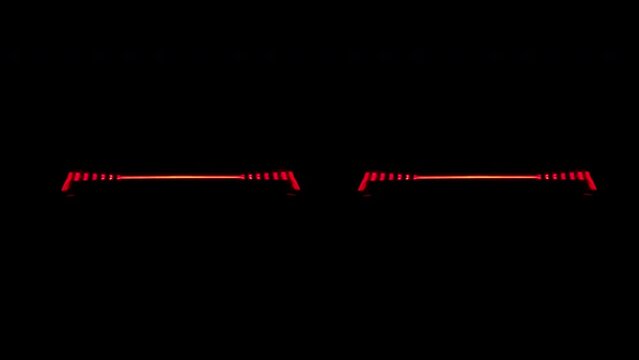 Close up of red headlight turning on, back automotive car optics e-tron, e tron GT.  Black background 4k