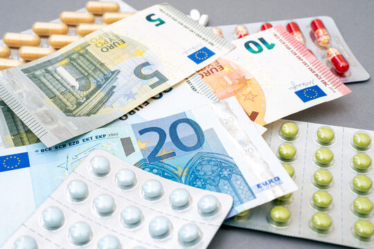 European Union currency and packs with pills on a table, concept picture about medical situation in EU