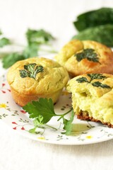 Patrick's Day Buns or muffins of green color with spinach juice of a trefoil of parsley leaves.
